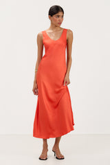 Front view of bright coral satin slip dress