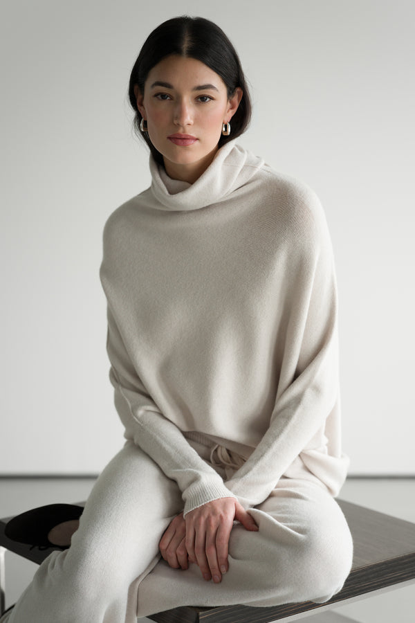 Asymmetric Draped Roll Neck | Light Beige | Seamless Knit