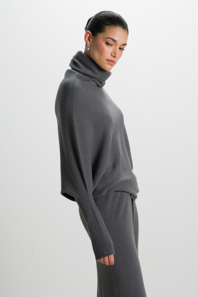 Asymmetric Draped Roll Neck | Charcoal | Seamless Knit