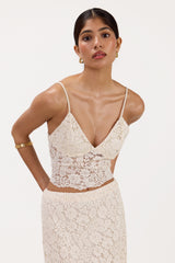 Front view of cream lace bra top