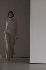 Asymmetric Draped Roll Neck | Light Beige | Seamless Knit
